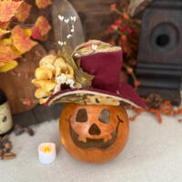 This is a hand carved pumpkin gourd for your fall table decorating. I have carved a happy face into the shell and made a autumn hat. This is a hand carved pumpkin gourd for your fall table decorating. I have carved a happy face into the shell and made a autumn hat.